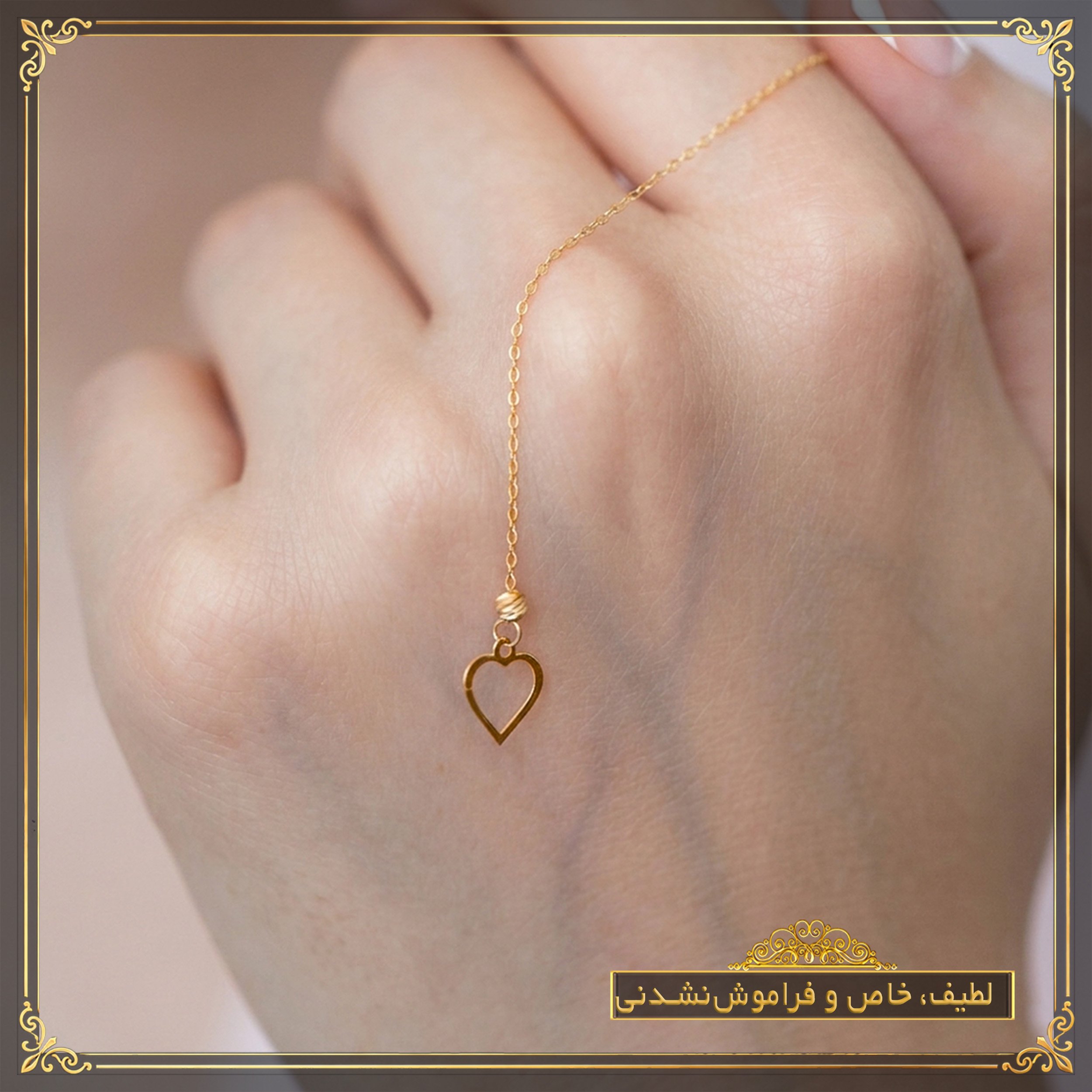 گوشواره بخیه‌ای طلا 18 عیار زنانه نیکان گلد مدل قلب — تصویر 2 از 5